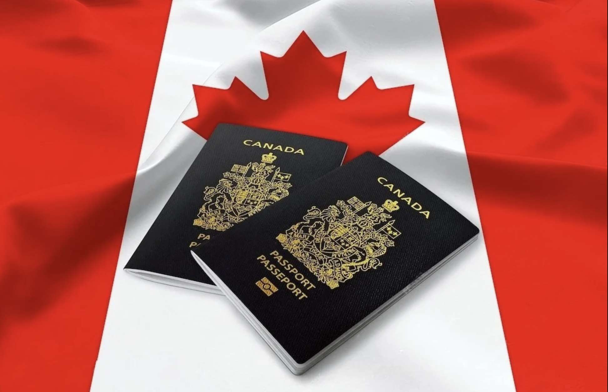 Gia hạn visa Canada – Hộ chiếu Canada trên nền quốc kỳ